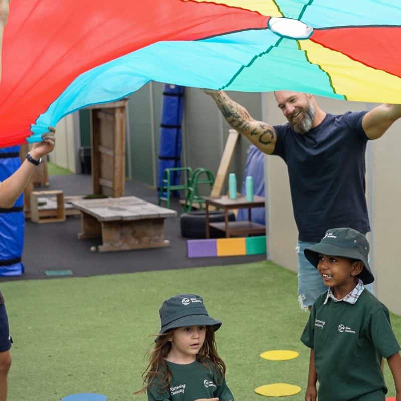 ChrisandSeanwithparachute | Eden Academy